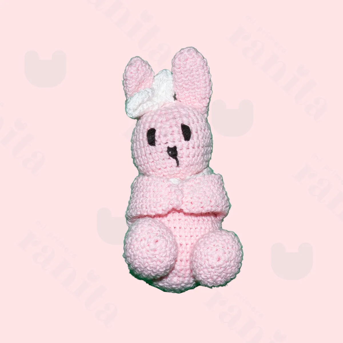 Pink rabbit doll with pink-embroidered muslin