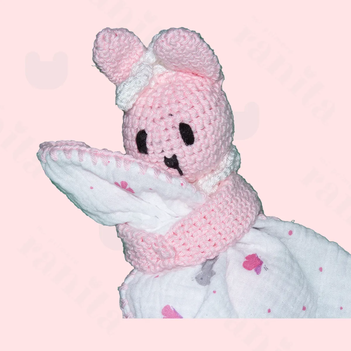 Pink rabbit doll with pink-embroidered muslin
